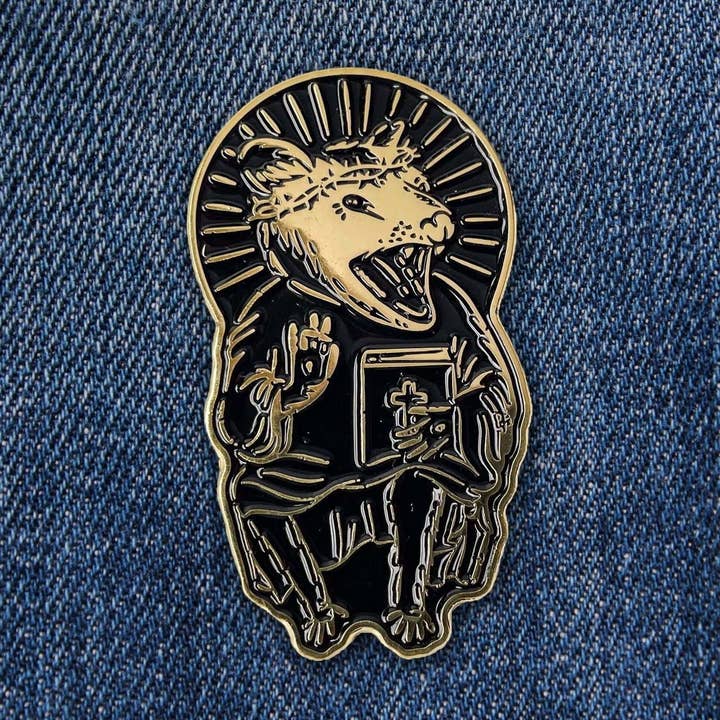 Eat Trash Praise Jesus Gold Enamel Pin for wholesale by Creepy Orca Supply Company