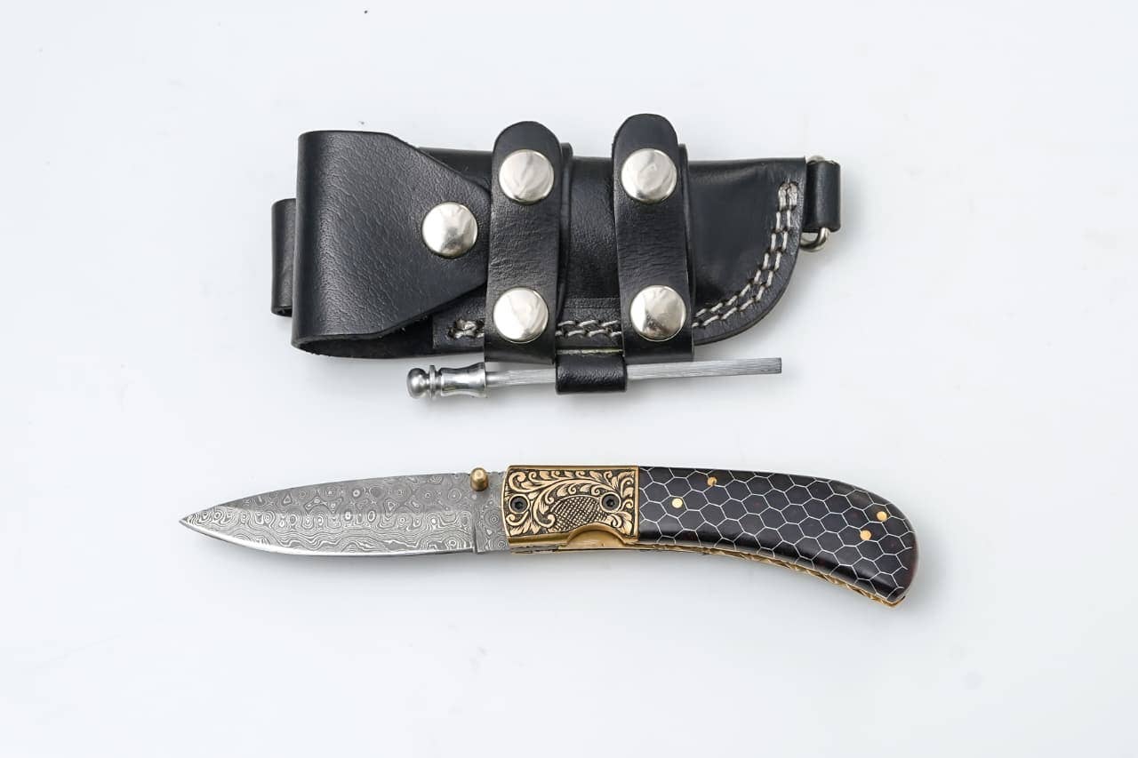 Titan International - Wholesale Pocket knife/holder - Hand-Engraved Damascus Folding Knife with Honeycomb Handle