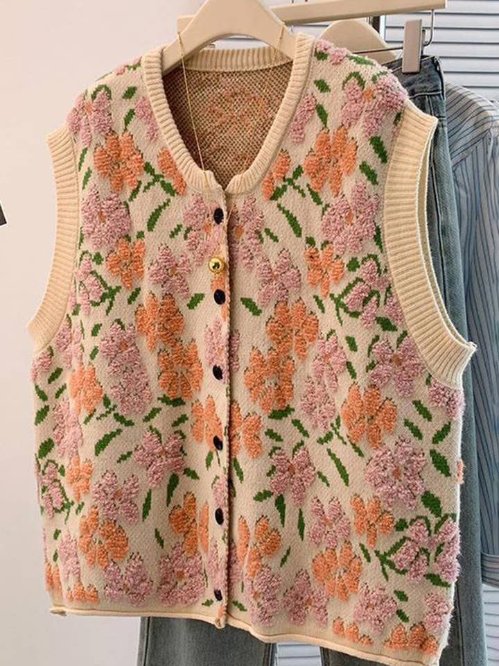 Blomstret strikvest med knapper foran for engroshandel hos Mccolin