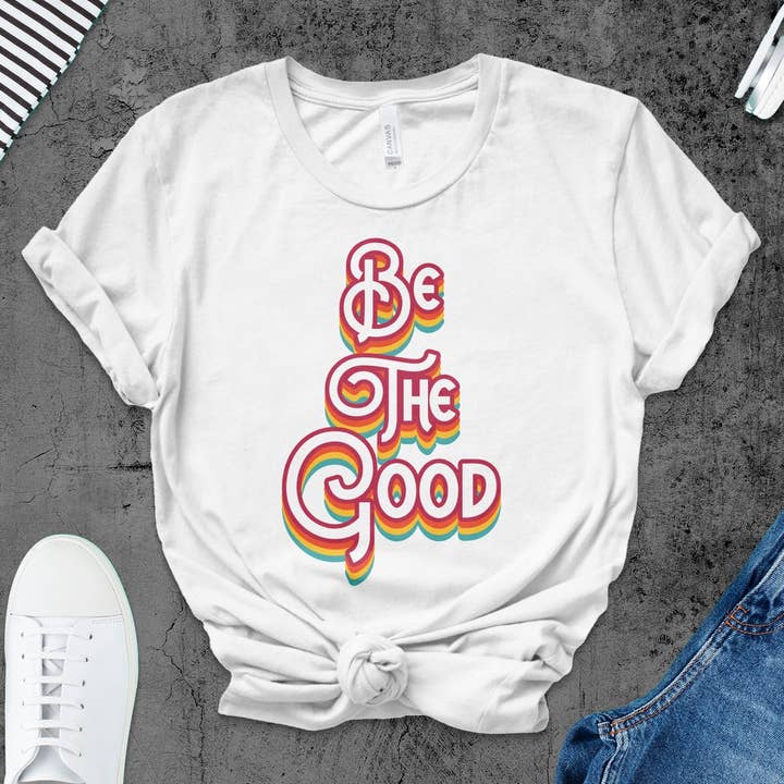 Kleurrijk 'Be The Good' Inspirerend T-shirt met Retro Design voor wholesale door FreakyTeeFactory