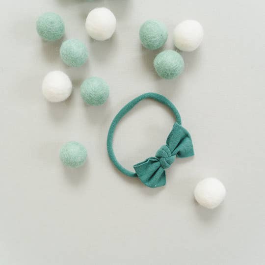 Itty Bitty Nylon Bow Headbands for wholesale by Golden Dot Lane