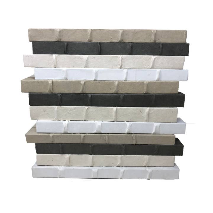 Juego de 12 volúmenes con bandas elevadas en tonos neutros para venta al por mayor de E. Lawrence, Ltd.