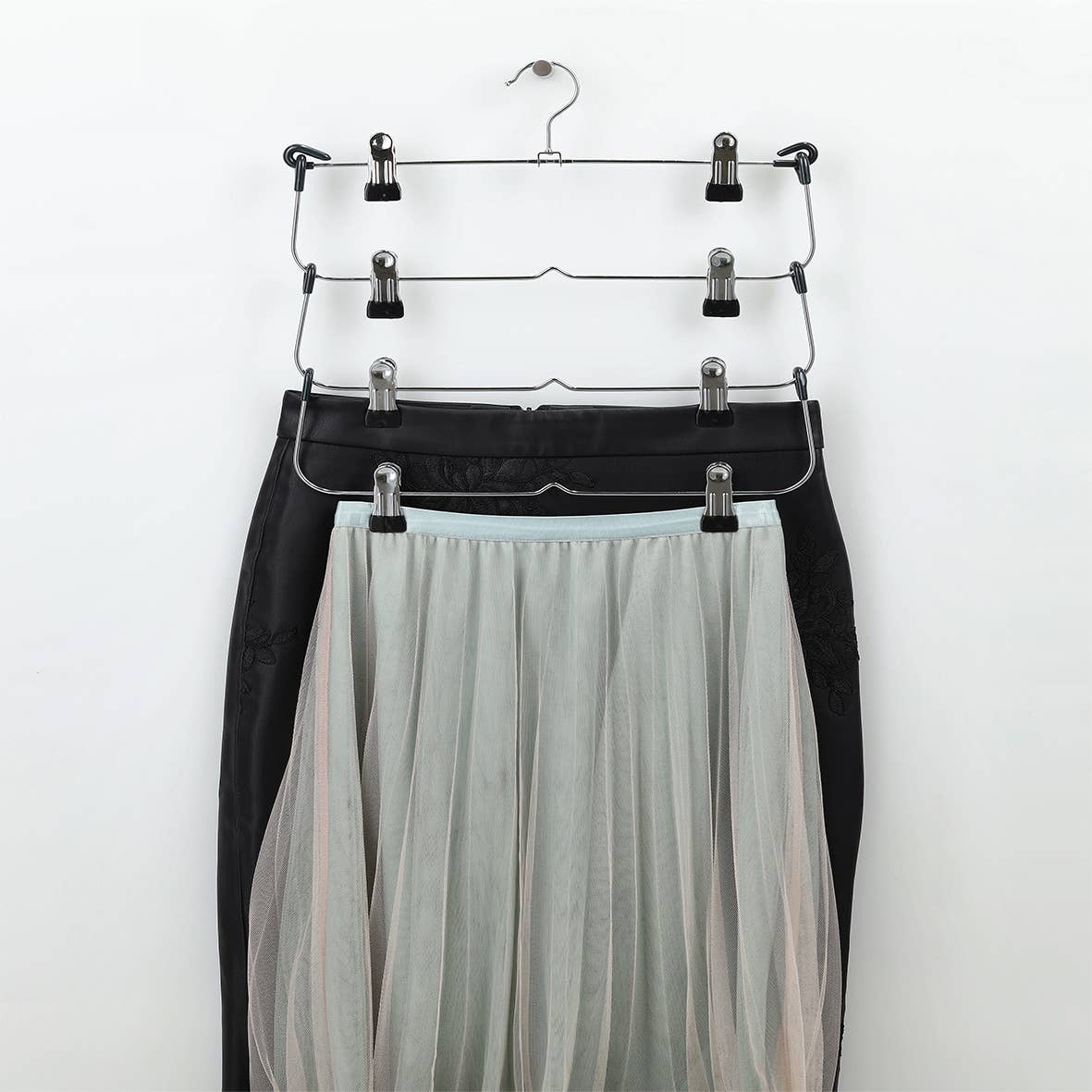 silver Multiple Skirt Hanger, Chrome-Plated Metal for wholesale on Faire2