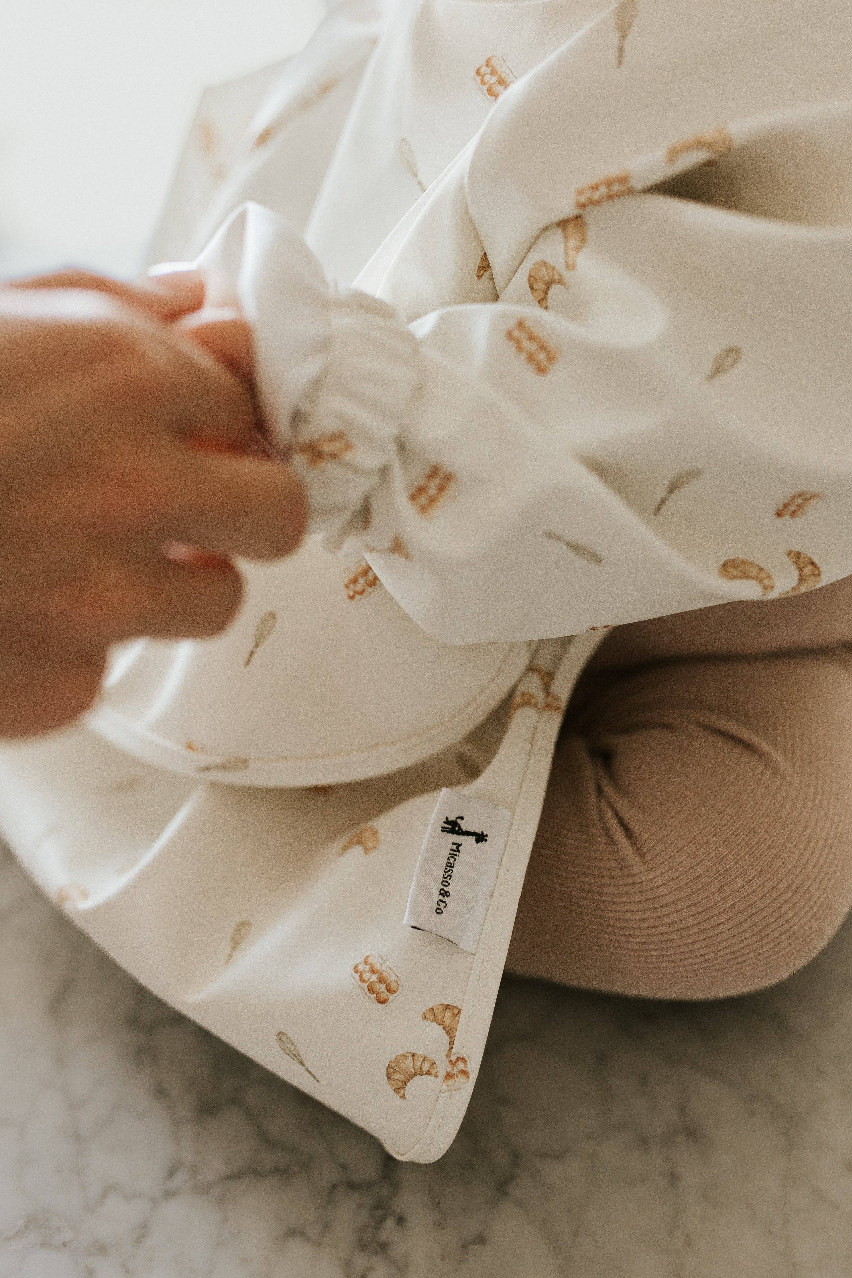 Micasso & Co - Wholesale Apron - Kids - Long-sleeve bib with integrated pocket8