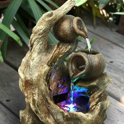 2 Jugs & Tree Trunk Fountain W/Rgb Led for wholesale by Hi-Line Gift Ltd.