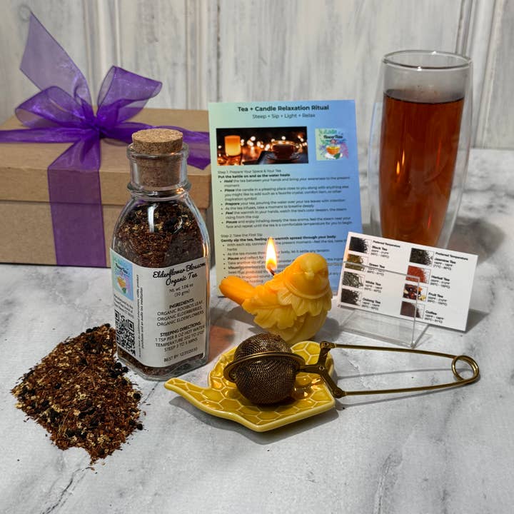 Luksus løsbladet te + afslapningsgaveæske med lys for engroshandel hos FlowerTeas