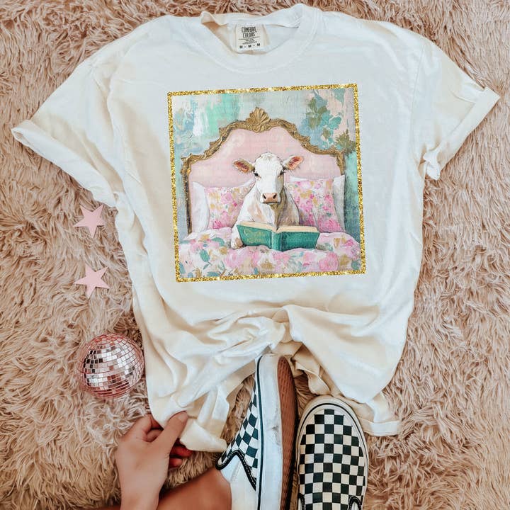 Floral cow in bed design on tee or sweatshirt for wholesale by Gunpowder and lace wholesale
