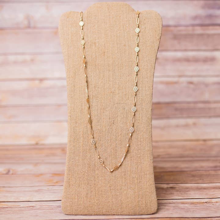 Collier long en chaîne dorée à motif floral pour la vente par Swara Jewelry LLC