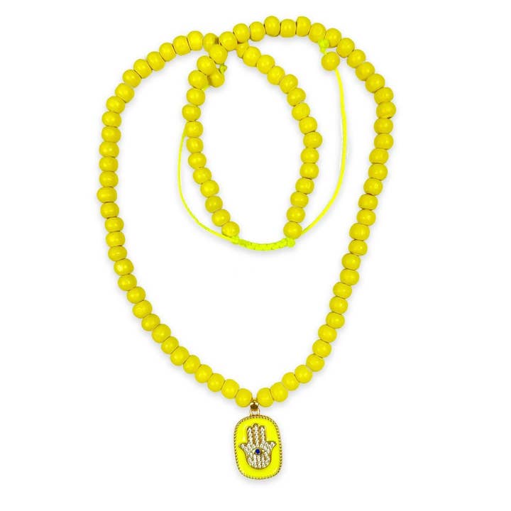 Hamsa necklace yellow for wholesale by Escapulario