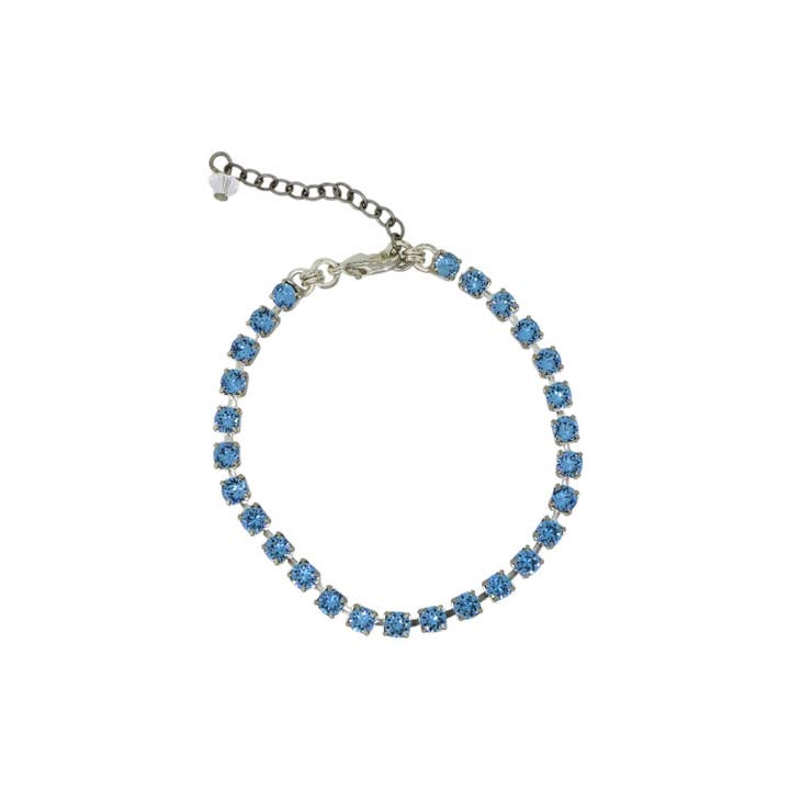 The Blue Tennis Bracelet in Platinum for wholesale by VICKISARGE