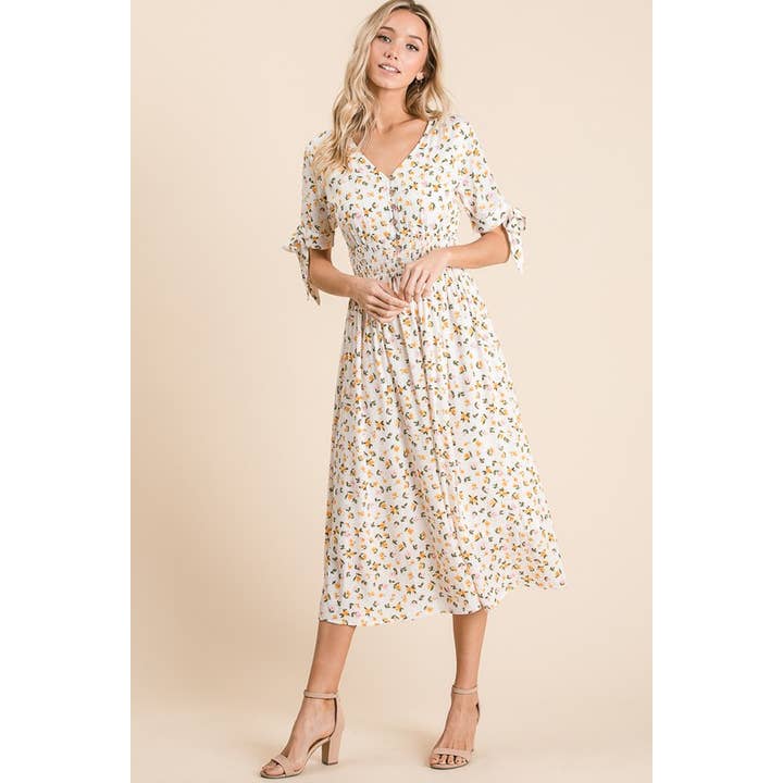 Robe midi fleurie avec boutons en bois pour la vente par Reborn J