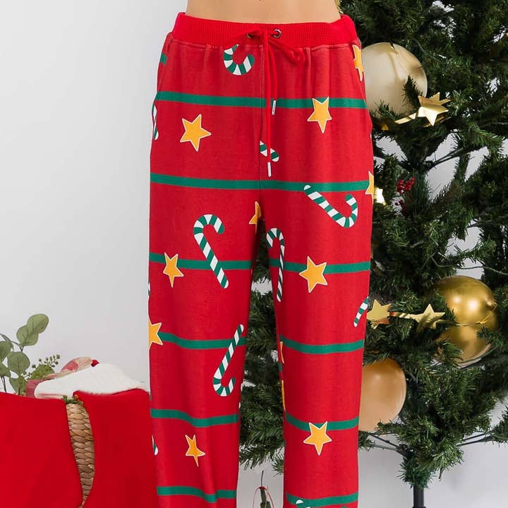 ELASTIC WAIST SELF TIE HOLIDAY PRINT PANTS for wholesale by IWT Brands