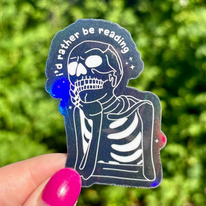 I'd Rather Be Reading Skeleton Sticker for wholesale by Awfullynerdy.co