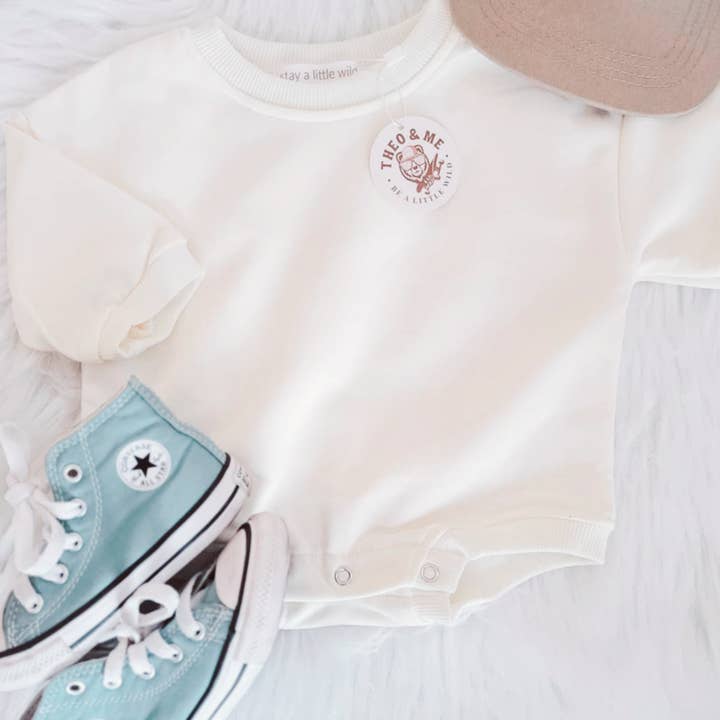 Ivory Unisex Summer Bubble Romper for wholesale by Rufflеѕ & Bоwtіеѕ - Affordable Boys & Girls Clothing