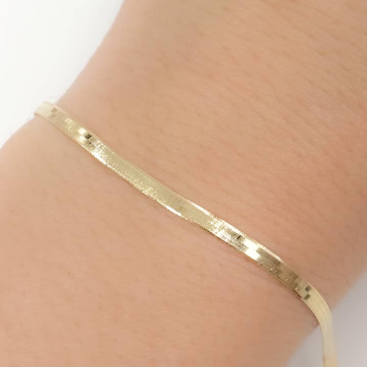 024G2CPY4L001Bracelet. 14k Solid Yellow Gold Herringbone Bracelet for wholesale on Faire1