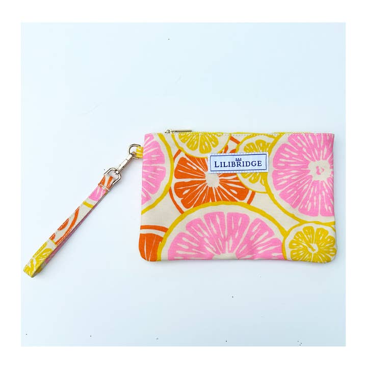 The Wristlet, Slice of Sun, Coated Canvas for wholesale by Lilibridge