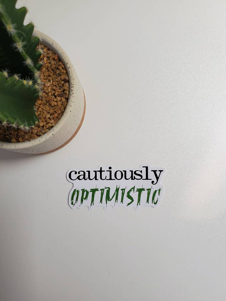 Cautiously Optimistic Text Sticker for wholesale by Fig Tree Works