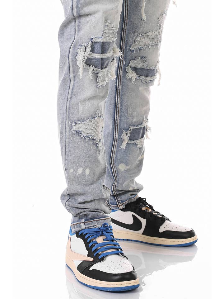 M BLUE RIP & REPAIR JEANS for wholesale on Faire