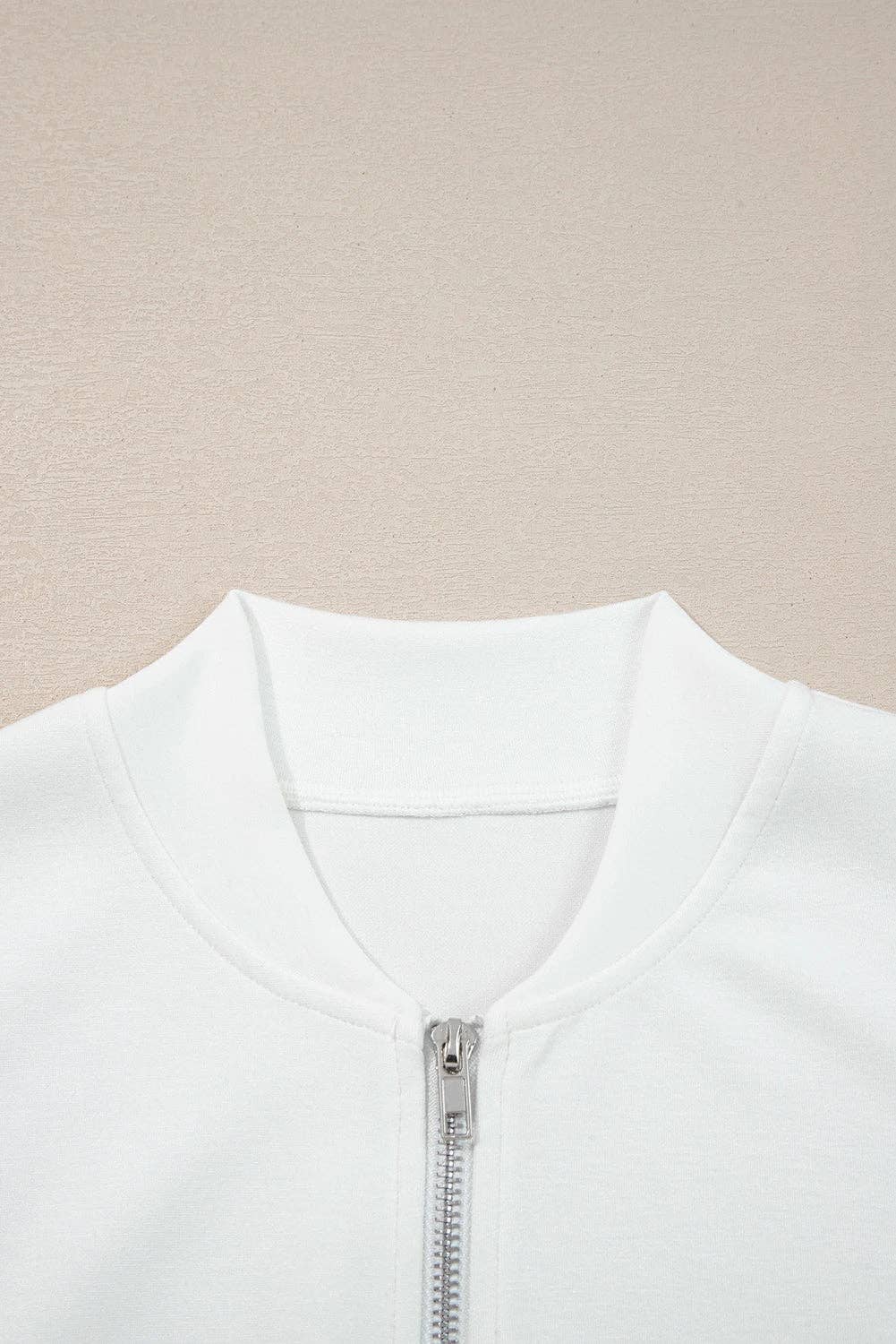 Vit Vit enfärgad stickad jacka med dragkedja och puffärmar för wholesale på Faire2