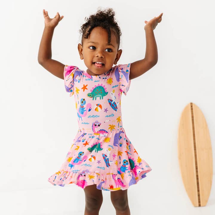 Pink Dino Baby Twirl Dress for wholesale by Kiki + Lulu