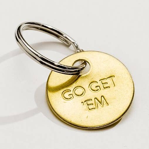 GO GET 'EM - Small Hand Pressed Brass Keychain for wholesale by Chaparral Studio
