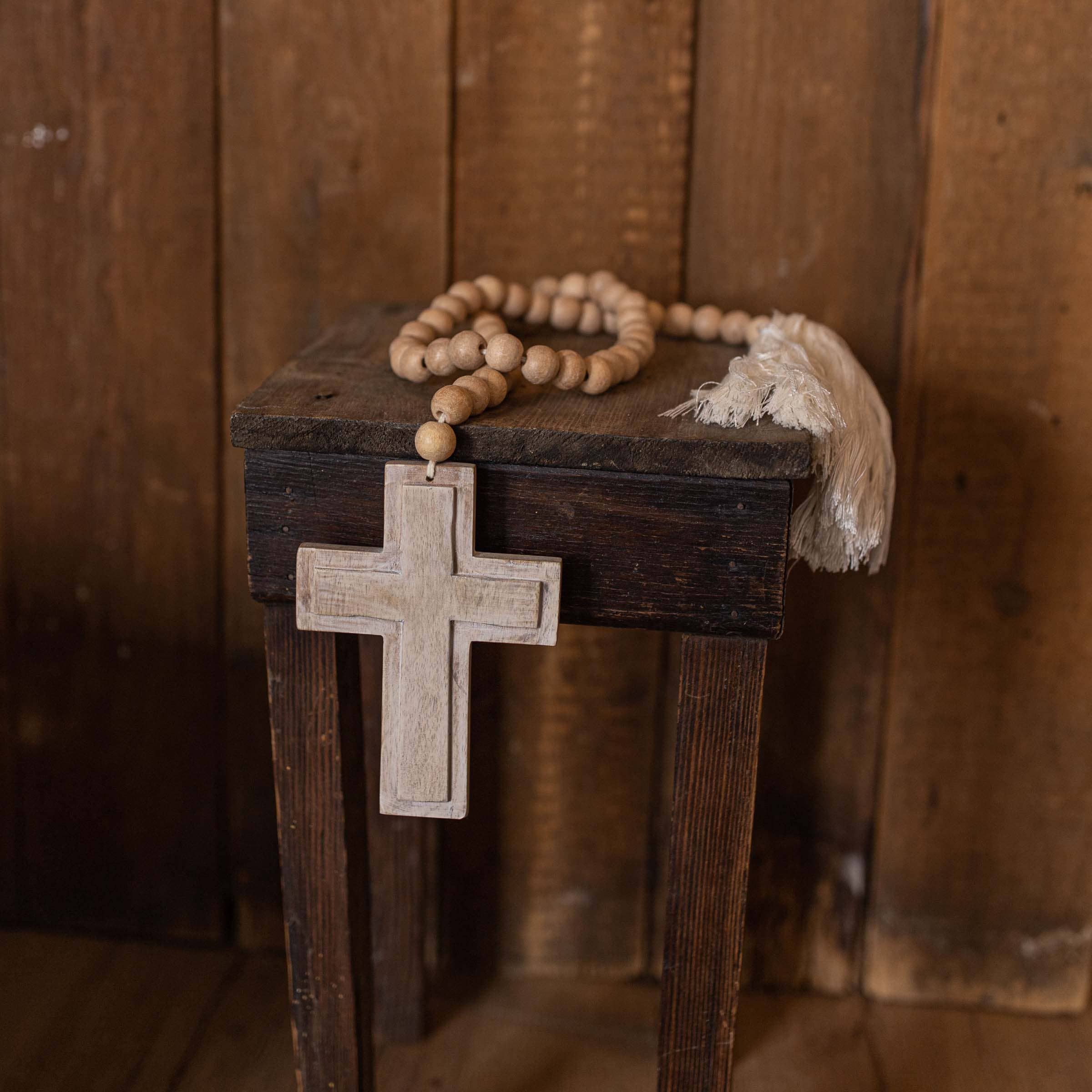 Foreside Home & Garden - Wholesale Decorative Tabletop Object - Kacy Easter Cross Natural Wood Bead Garland Cotton Tassel