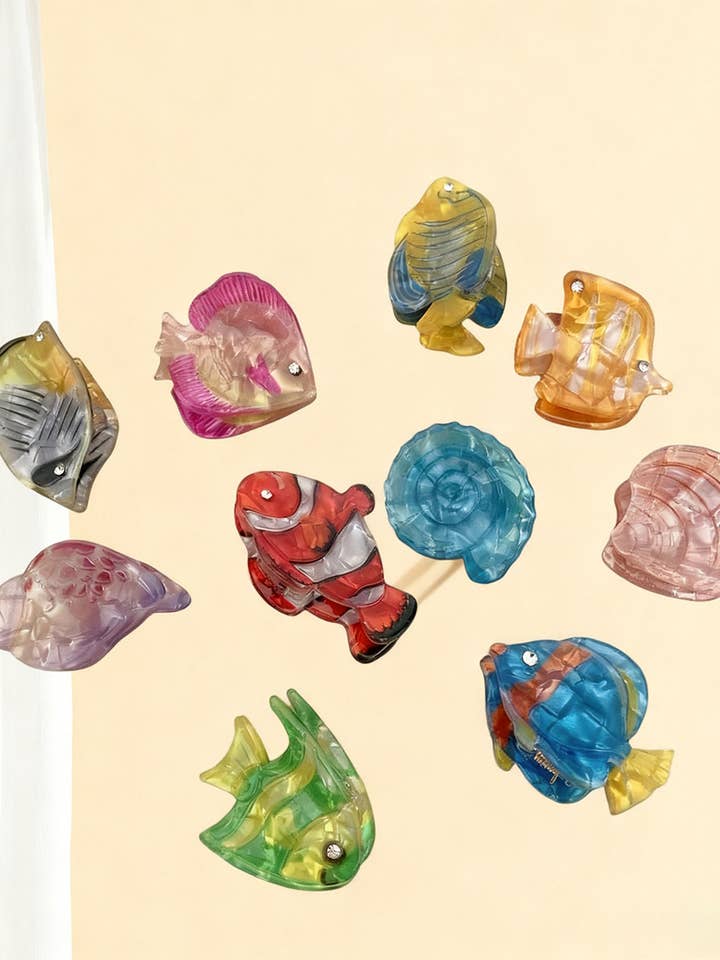 CWAHA07728_SEASHELL CONCH ACRYLIC HAIR CLAW BEACH STYLE for wholesale by NINEXIS