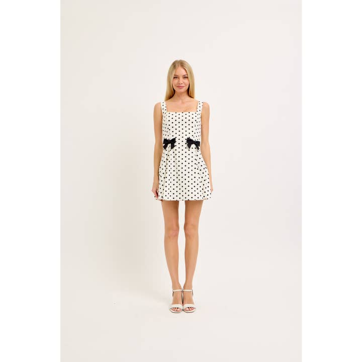 BOW AND PLEATED SKIRT DETAIL POLKA DOT SLEEVELESS MINI DRESS for wholesale by LENA