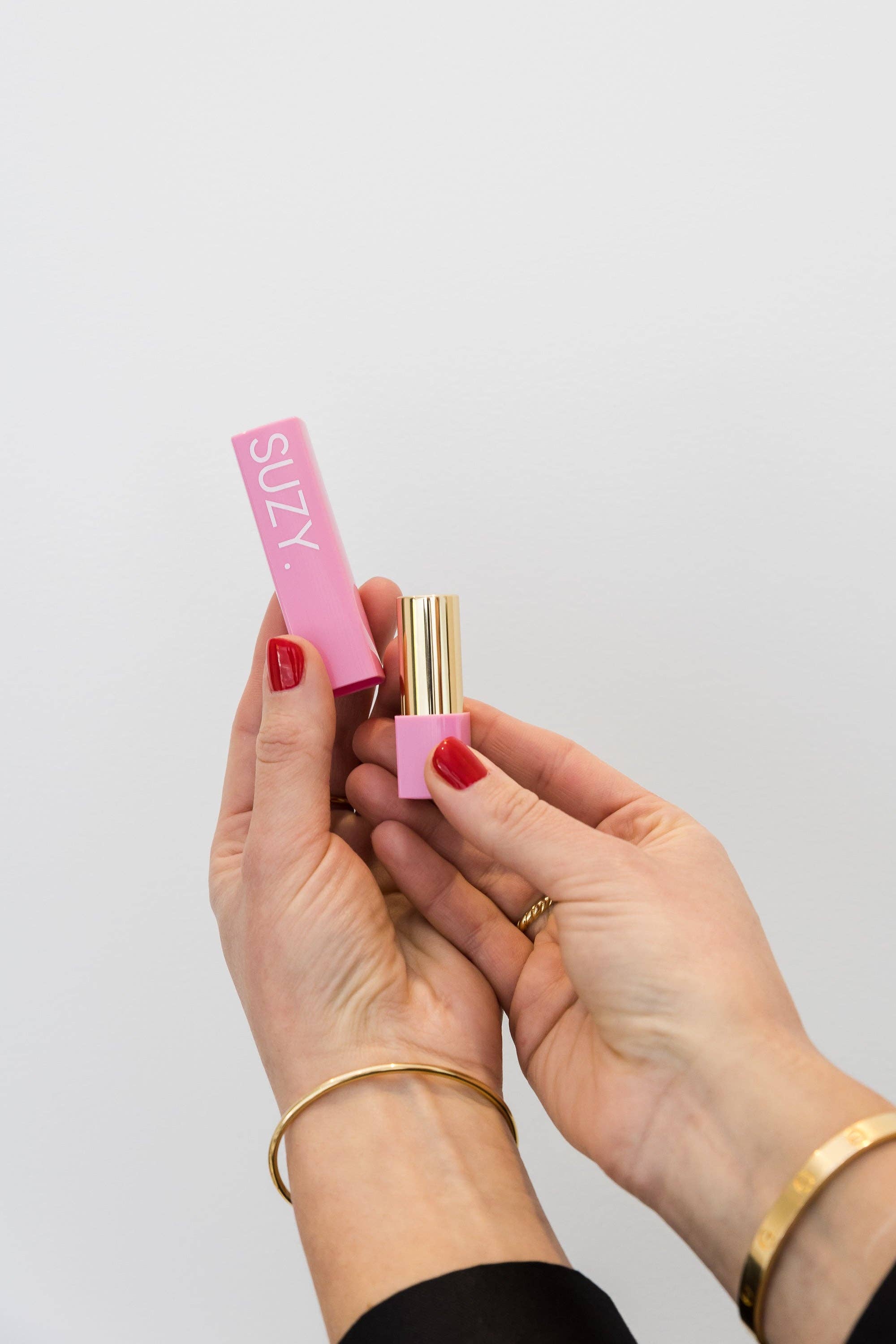 SUZY. Lipsticks - Wholesale Lipstick - MINI PINK ARCH CUSTOM BUNDLE! 4 colours of your choice x 4 saleable of each, FREE testers, FREE display stand, FREE express shipping1