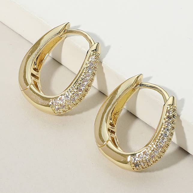 Gold Dipped CZ Stone Paved Oval Huggie Hoop Earrings for wholesale by Sensibling Corp.