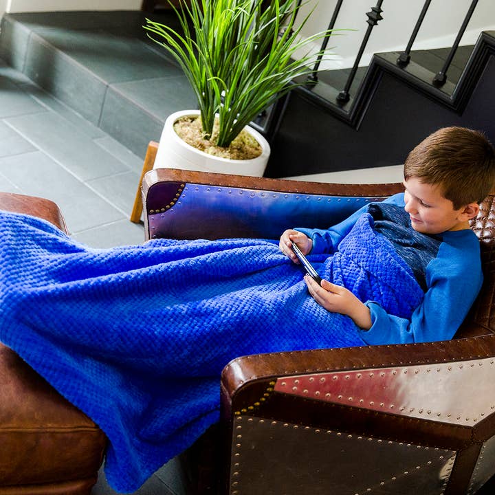 Kids Blanket With a Foot Pocket in Rockin’ Royal for wholesale by PediPocket: The Foot Pocket Blanket