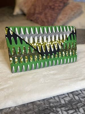 Signature Envelope Clutch | Green News for wholesale by Elena's Handcrafted Designs