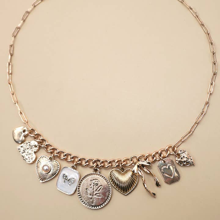 Gold CHARM NECKLACE-CUSTER BOW HEART PEARL LINK | 80N91414 for wholesale on Faire0