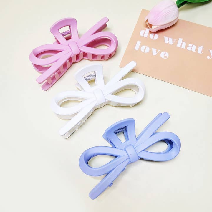 Matte Color Ribbon Shaped Hair Claw Clip for wholesale on Faire