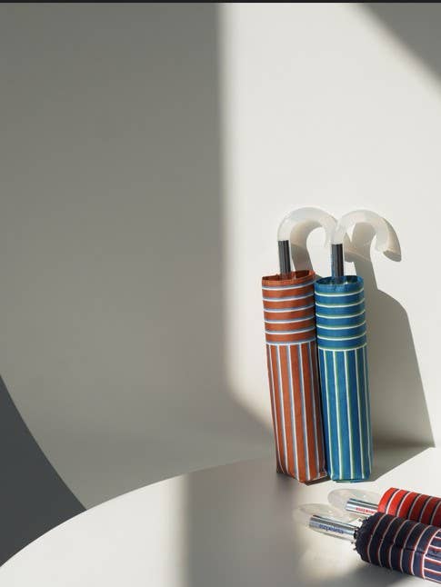 EZPELETA manual folding umbrella with stripes and curved handle. for wholesale by Ezpeleta