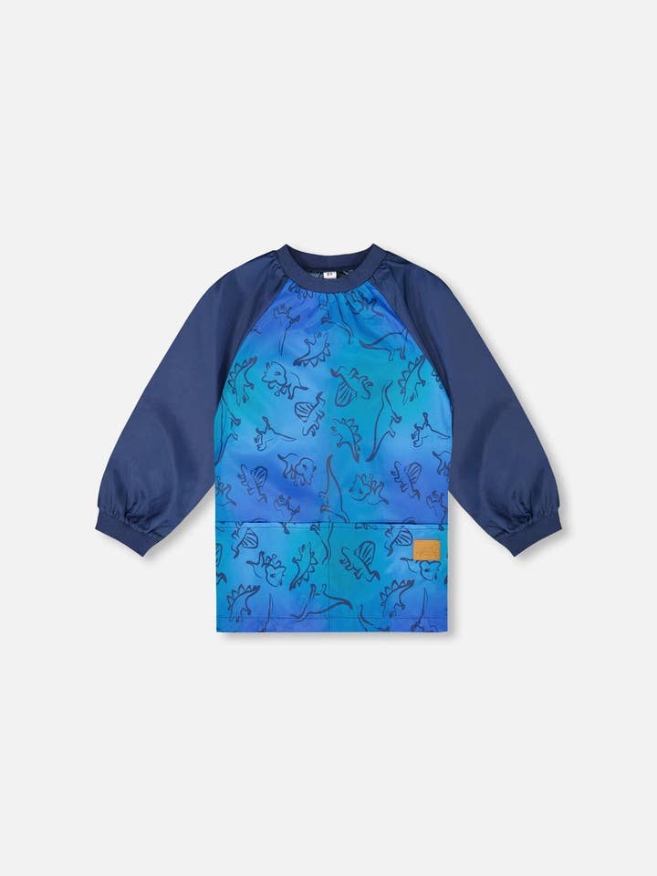 Tablier d'école dégradé bleu à motif de dinosaure pour la vente par Deux par Deux
