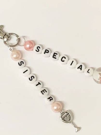 Special Sister Keychain for wholesale by The Little Bit Personal Co