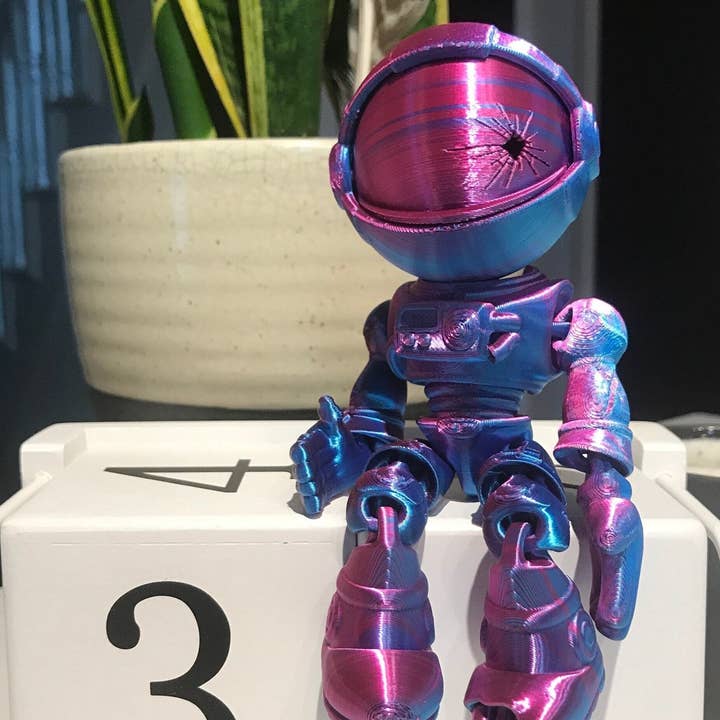 Fidget Astronaut Skeleton Friendly Companion for wholesale by Clever Contraptions