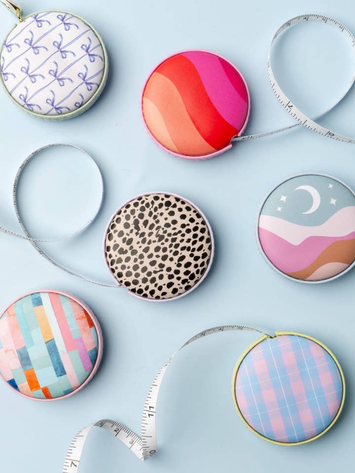 One Get A Hobby Mini Tape Measure - SHIPS ASSORTED for wholesale by Wholesale Accessory Market