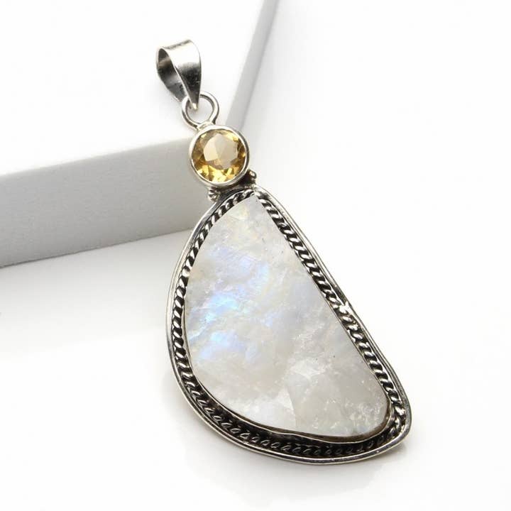 Raw moonstone with faceted gem, silver pendant for wholesale by UniArt