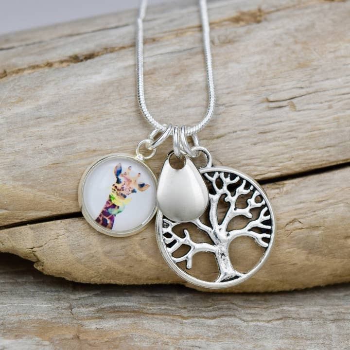 Giraffe Necklace w/ Tree Silver Necklace for wholesale by Eye Catching Jewelry