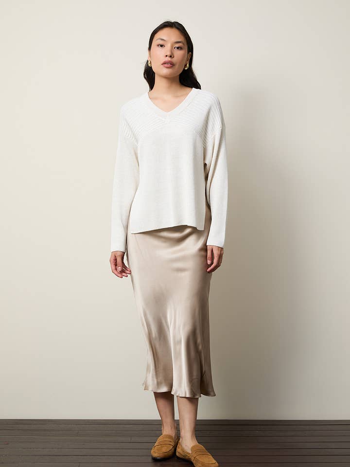 Jersey de lentejuelas con escote en V y detalle en la espalda para venta al por mayor de Serianno