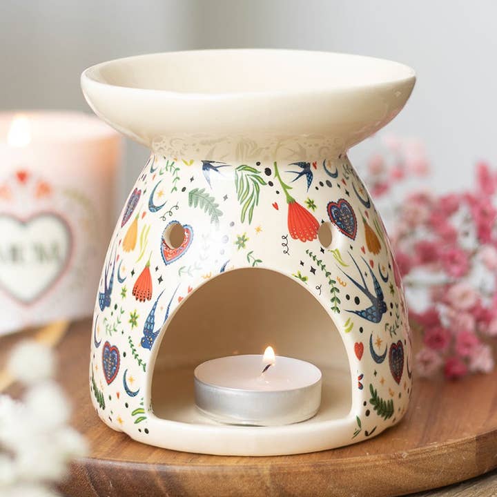 Cremefarbener Öl-Brenner mit Mitternachtsblütenmuster für den Großhandel von Something Different Wholesale