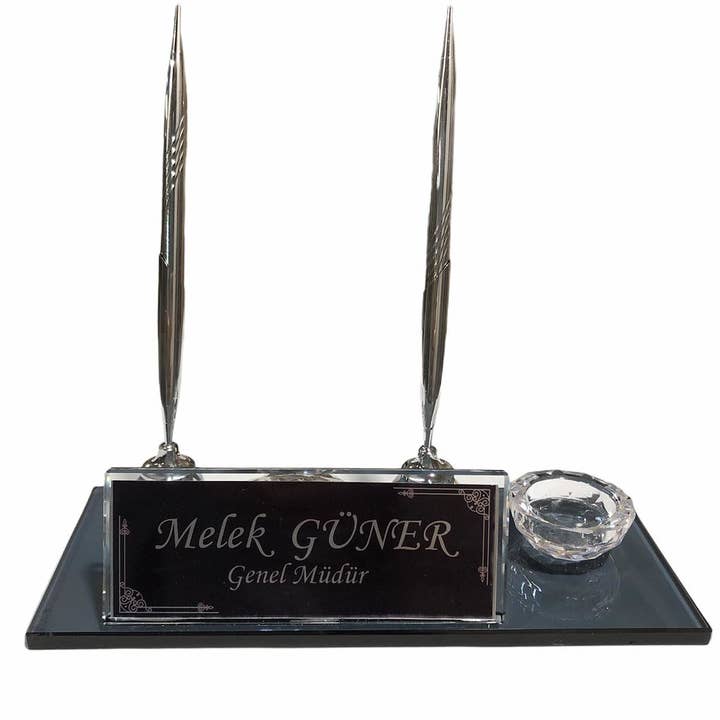 Plaque signalétique de bureau en verre noir MOOG avec horloge pour la vente par MOOG LLC