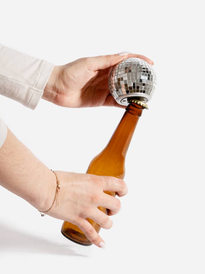 Disco bottle opener for wholesale by L'expressionist