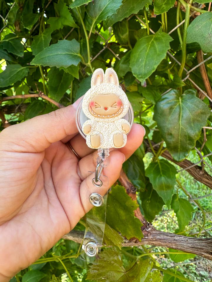 Gul Siddende Monster Kortholder for engroshandel hos Las Mamukis