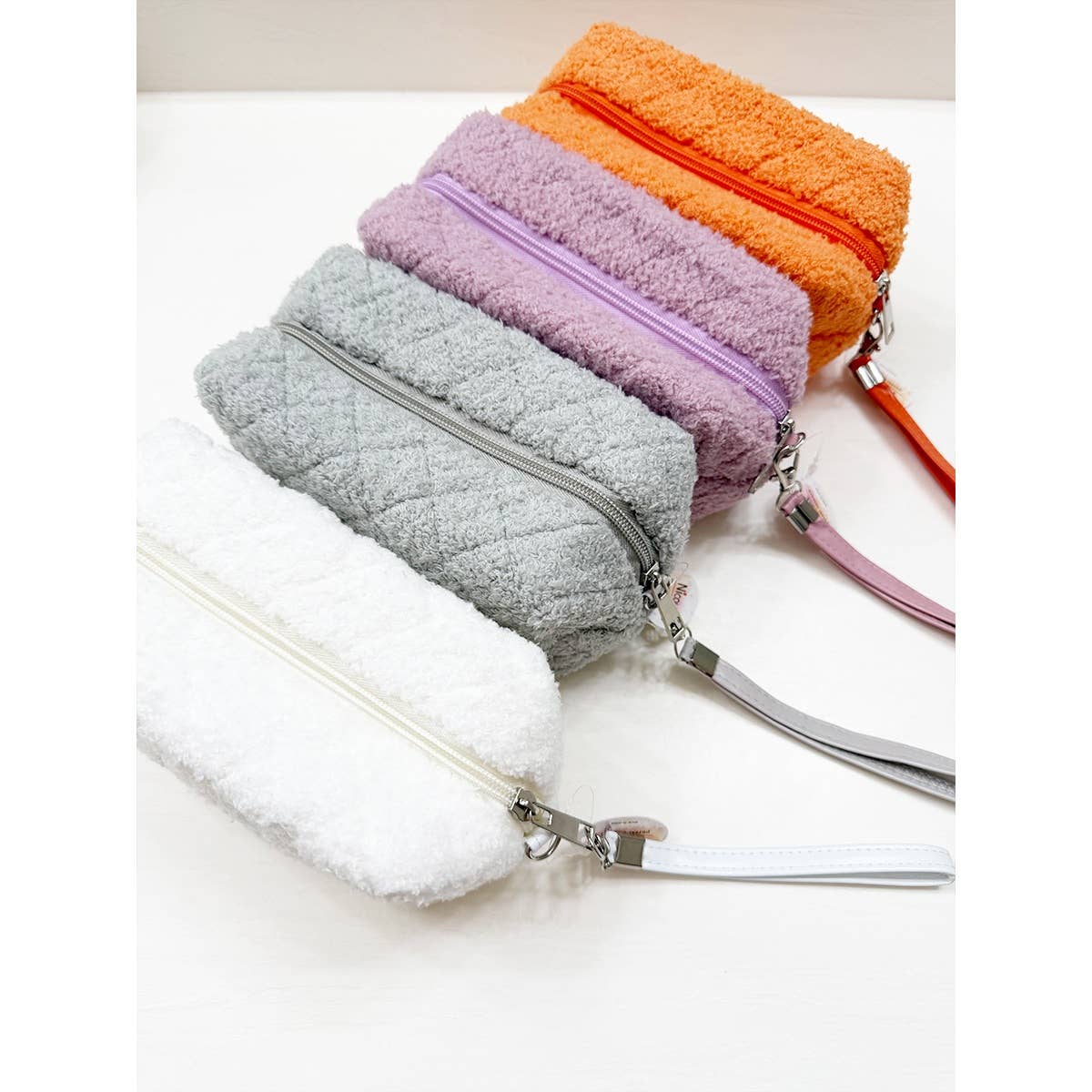MIX COLOR Soft Plushie Teddy Cloth Light Weight Cosmetic Bag for wholesale on Faire1