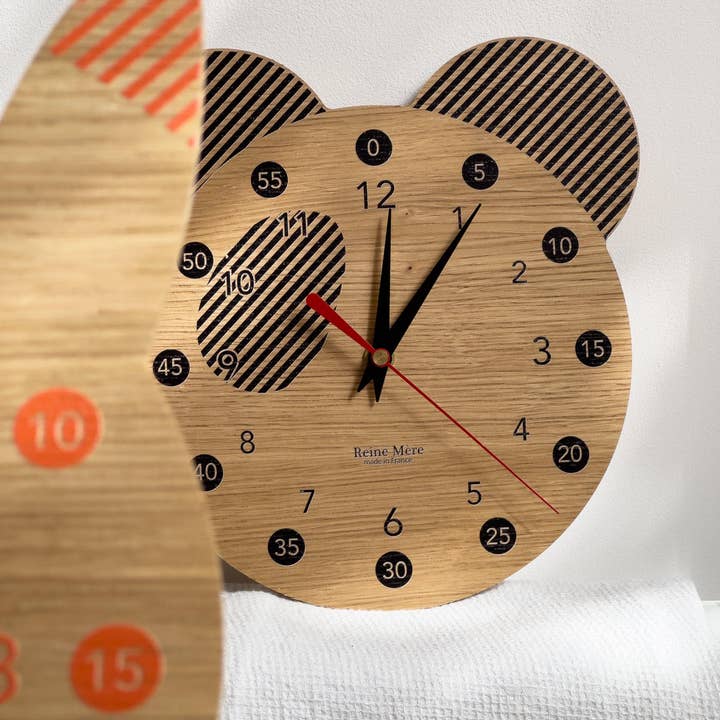 Panda - Pædagogisk ur i egetræsfinér for engroshandel hos Reine Mère