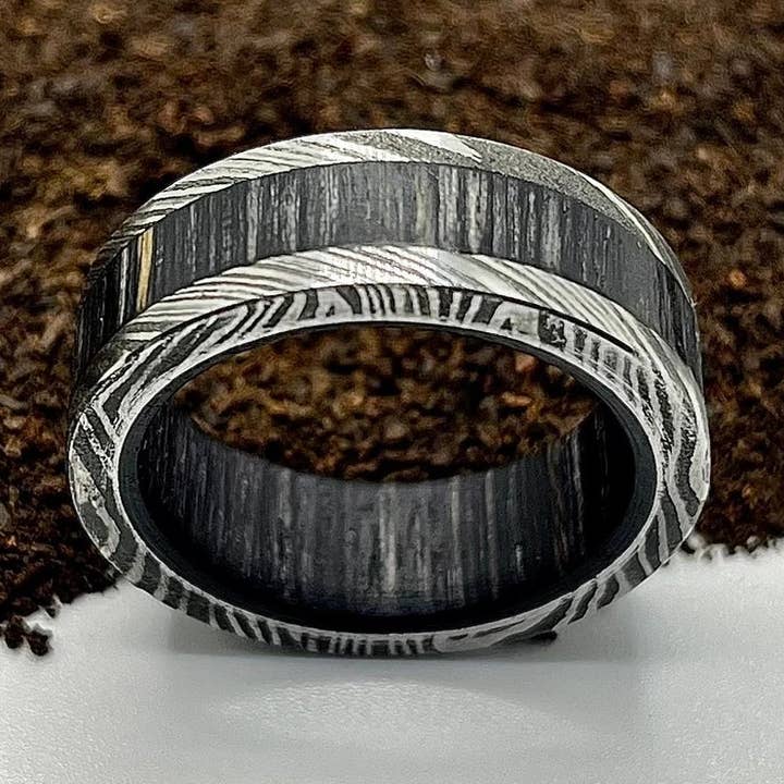 Damascus Steel Ring Lined with Wide Black Wood Sleeve for wholesale by RustyStudioUSA