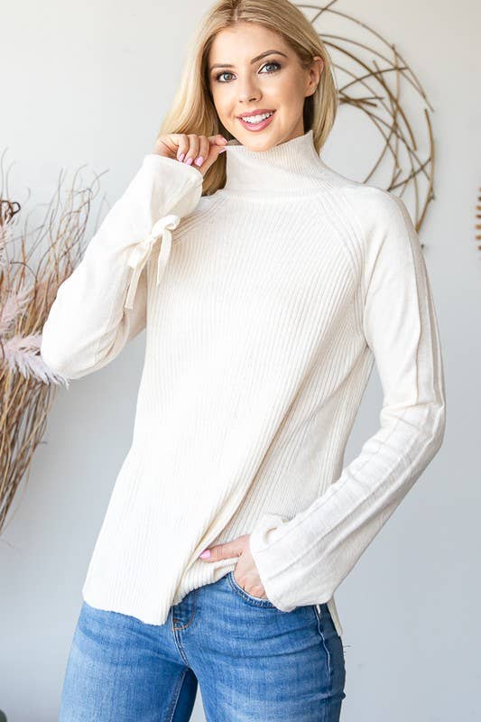 HEIMISH - Vendita all'ingrosso Top in maglia - Donna - LP137 COLLO ALTO MANICA LUNGA CON DETTAGLIO FIOCCO10